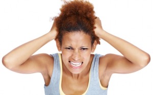 Very-frustrated-and-angry-woman-pulling-her-natural-hair-300x186